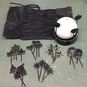 Candle holder with 7 seasons of decor and large white candle